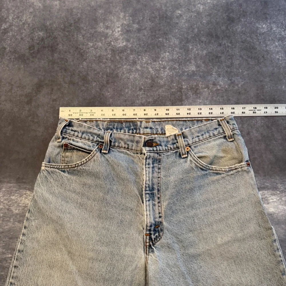 VTG Levis 550 Orange Tab Relaxed Fit Tapered Leg Jeans 33x32 Light Wash Made USA